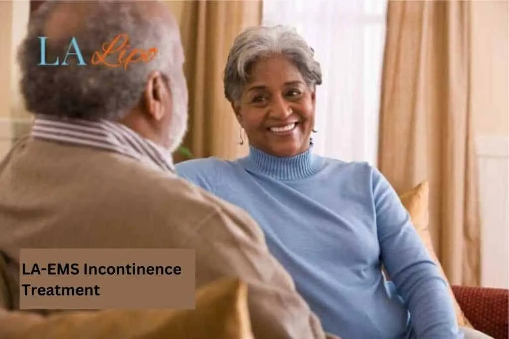 Couple sat smiling at each other - LA-EMS treatment Hampstead